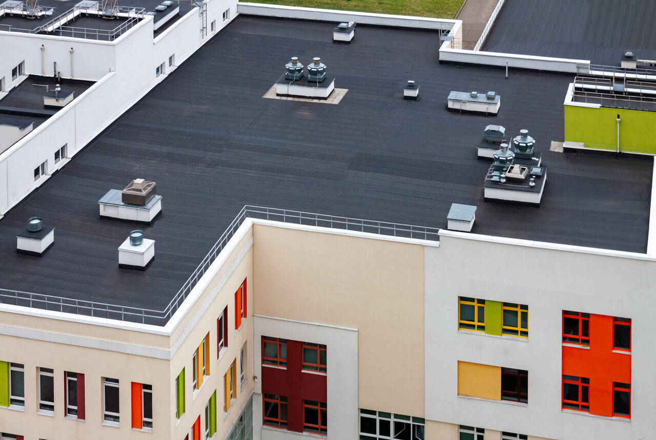 Rooftop HVAC equipment on a modern commercial building roof