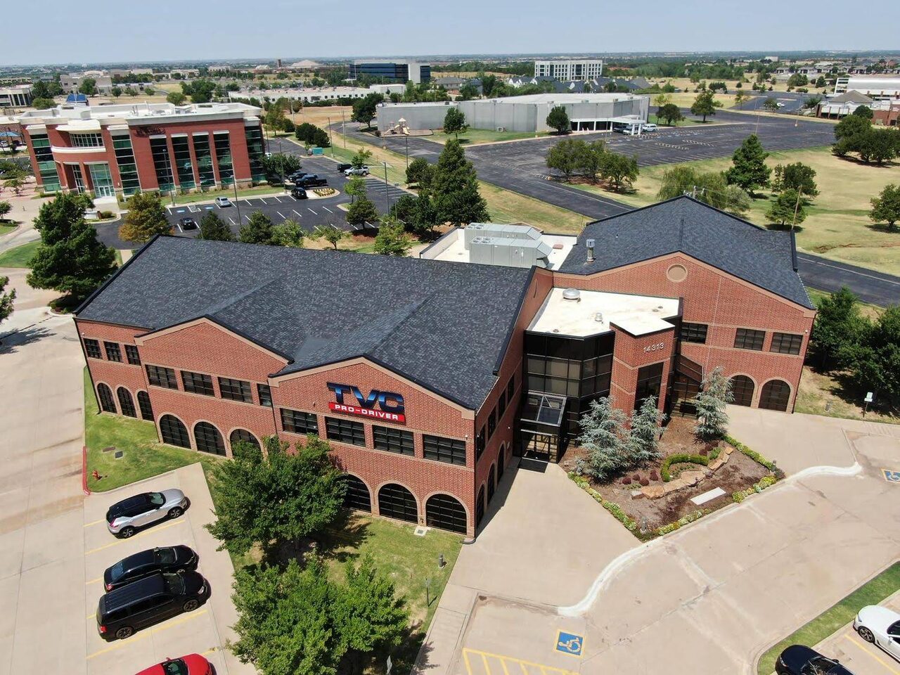 Drone photograph of a commercial office building with a new roof
