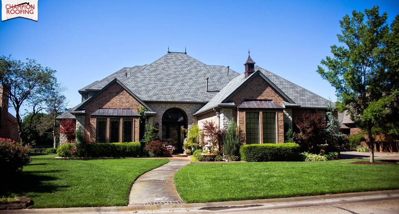 Designer shingle roof on a brick and stone home in Oklahoma City