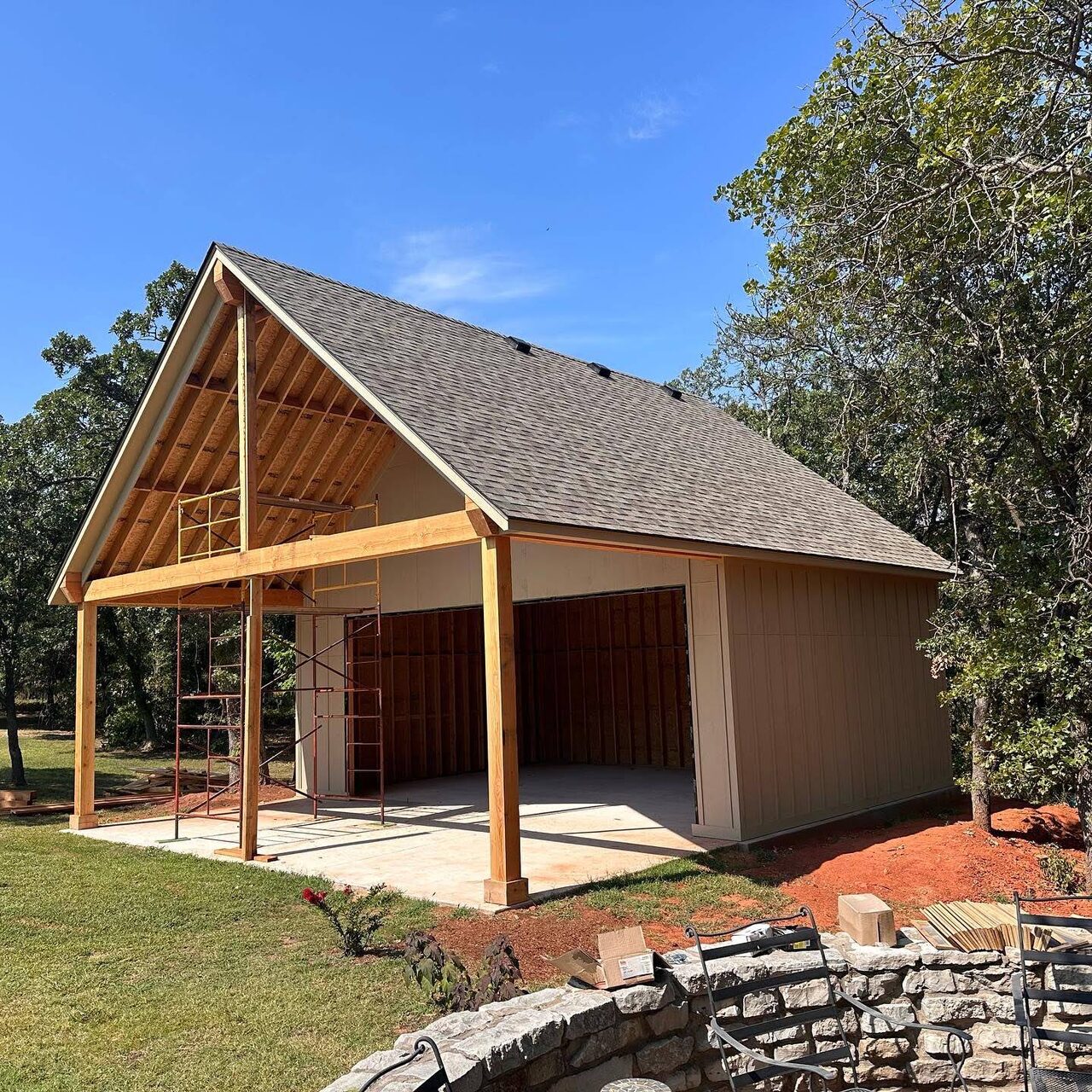 A timber framed pavilion with a newly installed shingle roof